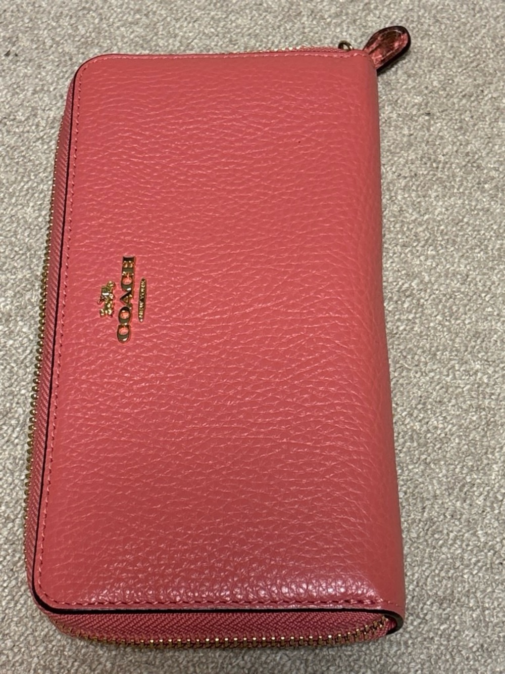 Coach Pebbled Zip Wallet in Coral Pink with Gold Hardware
